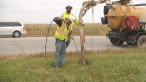 Workers seen here breaking ground in Community of Yoder.